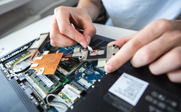 guy repairing computer