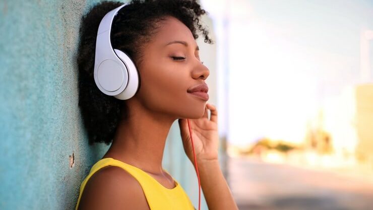 Girl outside with headphones