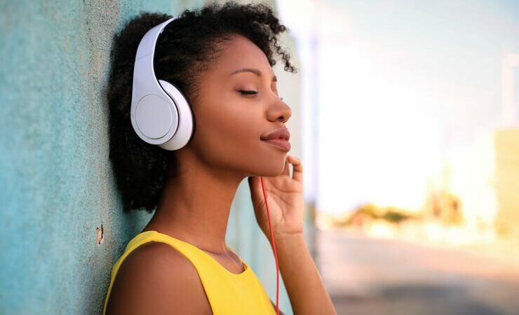 Girl outside with headphones