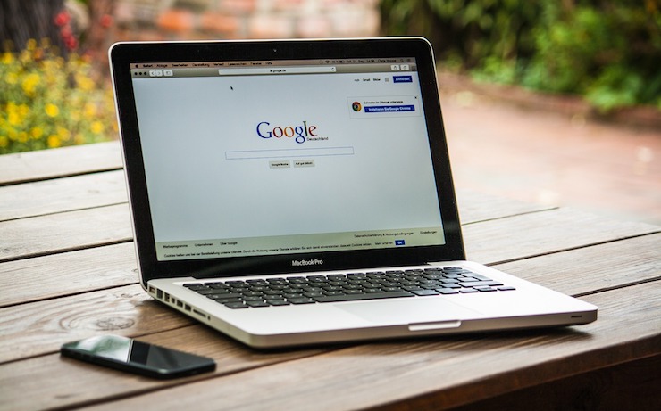 laptop computer with google open on the screen