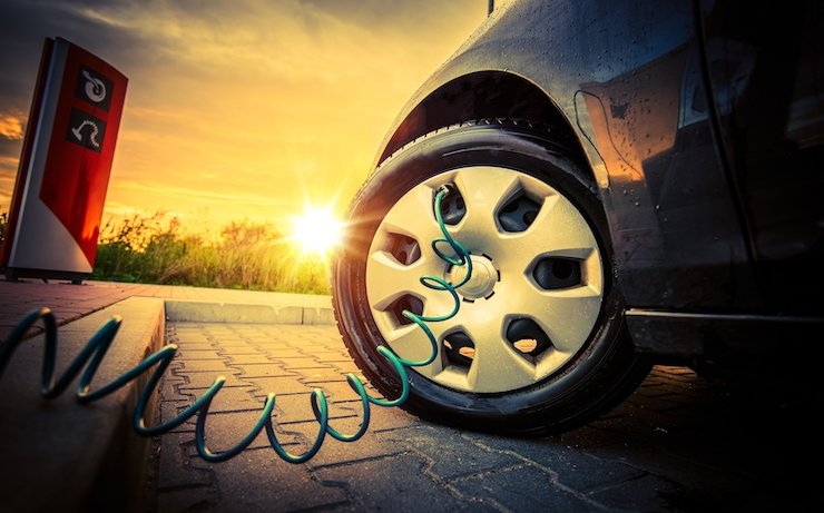 pumping bike tyres at petrol station