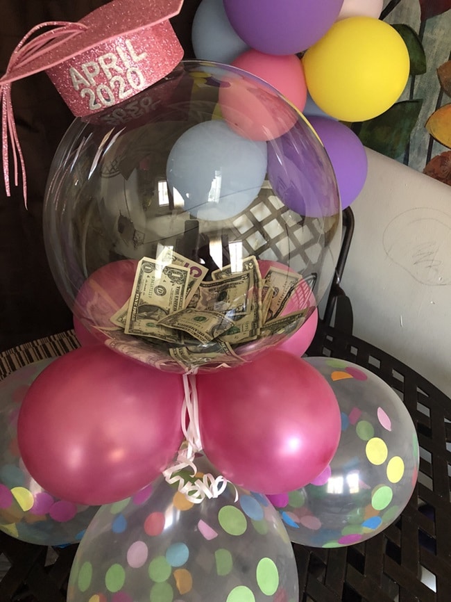 Money inside of balloons