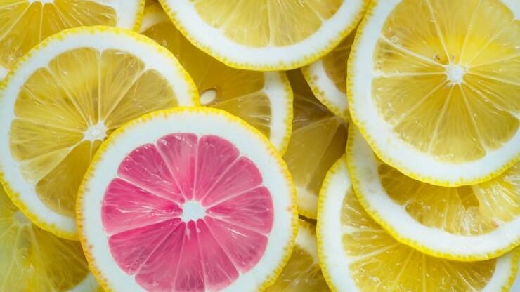 Pile of lemon slices with one dyed pink