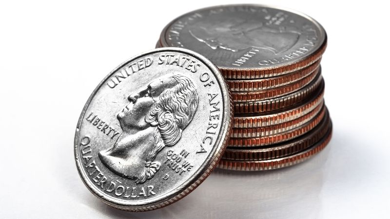 Image of stacked quarter dollar coins