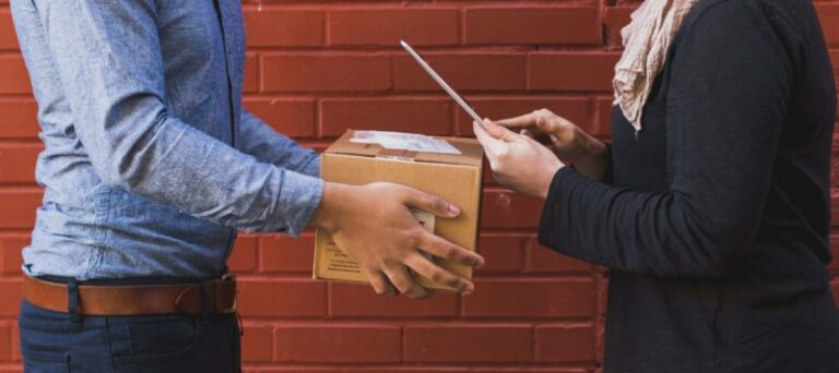 person receiving shipping box
