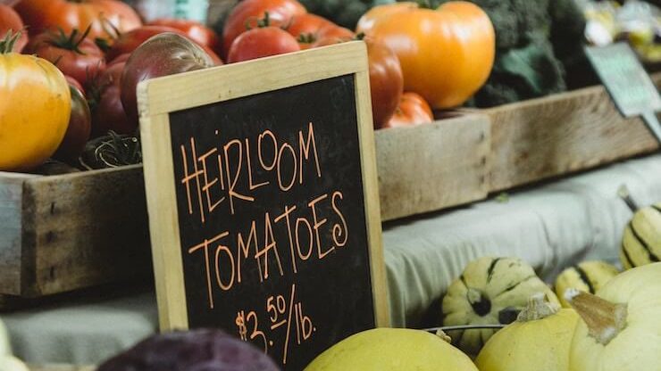 Heirloom tomatoes for sale on a counter