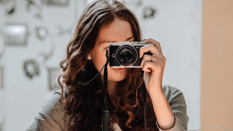 woman taking pictures as a hobby